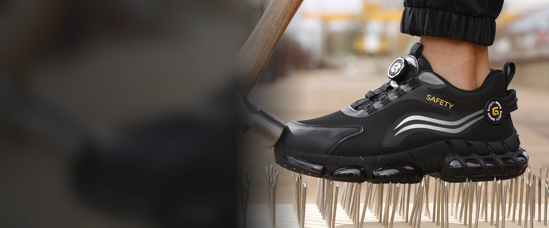Model F101BK black rotary-lace safety sneaker standing on nails while a hammer strikes the toe